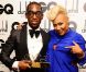 Le rappeur Tinie Tempah tout sourire avec Emeli Sandé qui lui remettait l'award d'Artiste de l'Année lors des GQ Men Of The Year Awards 2012 à la Royal Opera House. Londres, le 4 septembre 2012.
