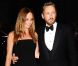 Stella McCartney en combinaison bustier et son époux Alasdhair Willis lors des GQ Men of the Year Awards à la Royal Opera House. Londres, le 4 septembre 2012.