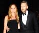 Stella McCartney en combinaison bustier et son époux Alasdhair Willis lors des GQ Men of the Year Awards à la Royal Opera House. Londres, le 4 septembre 2012.