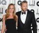 Stella McCartney en combinaison bustier et son époux Alasdhair Willis lors des GQ Men of the Year Awards à la Royal Opera House. Londres, le 4 septembre 2012.