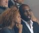 Teddy Riner et sa compagne Luthna lors du match du Paris Saint-Germain face à Toulouse (2-0) le 14 septembre 2012 à Paris