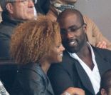 Teddy Riner et sa compagne Luthna lors du match du Paris Saint-Germain face à Toulouse (2-0) le 14 septembre 2012 à Paris