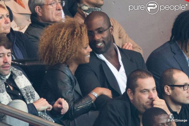 Teddy Riner et sa compagne Luthna lors du match du Paris Saint-Germain face à Toulouse (2-0) le 14 septembre 2012 à Paris