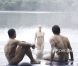 Sophie Hélard, ancienne danseuse du Crazy Horse pose avec Wesley Fofana et Julien Pierre dans l'édition 2013 du calendrier des Dieux du stade 2013