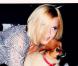 Photo de Geri Halliwell avec un chien postée sur sa page Facebook officielle.