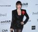 Rose McGowan a sorti la veste à paillettes à la soirée de gala de l'amfAR à Los Angeles le 11 octobre 2012.
