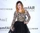 Rumer Willis prend la pose sur le tapis noir à la soirée de gala de l'amfAR à Los Angeles le 11 octobre 2012.