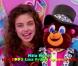 Mila Kunis lorsqu'elle avait dix ans dans un spot Lisa Franck en 1993