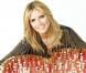 Heidi Klum fait sa déclaration d'amour à la ville de Berlin avec les nouveaux gloss d'Astor Cosmetics dont elle est ambassadrice et consultante artistique. Le 16 octobre 2012.