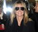 Heidi Klum arrive à l'aéroport d'Heathrow à Londres. Le 16 Octobre 2012.