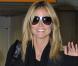 Heidi Klum arrive à l'aéroport d'Heathrow à Londres. Le 16 Octobre 2012.