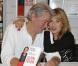Alain Delon et Nicole Calfan, tellement complices, pour dédicacer le livre de cette dernière,  Lettre entr'ouverte à Alain Delon , le mardi 30 octobre 2012 au Drugstore Publicis à Paris.
