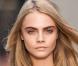 Cara Delevingne lors du défilé Burberry Prorsum automne-hiver 2013-2014 à Londres. Le 18 février 2013.