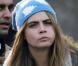 Cara Delevingne arrive à Hyde Park pour le défilé Burberry Prorsum automne-hiver 2013. Londres, le 18 février 2013.