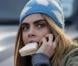 Cara Delevingne arrive à Hyde Park pour le défilé Burberry Prorsum automne-hiver 2013. Londres, le 18 février 2013.