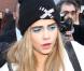 Cara Delevingne arrive au Topshop Show Space à Londres pour le défilé Topshop Unique automne-hiver 2013. Le 17 février 2013.
