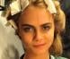 Cara Delevingne dans les coulisses du défilé Issa à Londres. Le 16 février 2013.