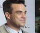 Robbie Williams lors de la présentation de la nouvelle collection de sa marque Farrell. A Berlin, le 26 février 2013.