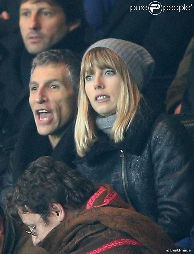 Nagui et sa femme Mélanie Page enthousiastes lors du match entre le Paris Saint-Germain et l'Olympique de Marseille (2-0) le 27 février 2013 à Paris