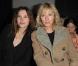 Virginie Ledoyen et Karin Viard au défilé de mode Paul &amp; Joe, prêt-à-porter automne-hiver 2013-2014 au Palais de Tokyo à Paris, le 5 mars 2013.