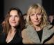 Karin Viard et Virginie Ledoyen au défilé de mode Paul &amp; Joe, prêt-à-porter automne-hiver 2013-2014 au Palais de Tokyo à Paris, le 5 mars 2013.