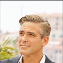 George Clooney et la houpette pour présenter Ocean Thirteen à Cannes en mai 2007.