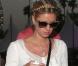 Paris et Nicky Hilton, stylée en mini-short avec un sac Céline en bandoulière et ses bottines Chloé aux pieds. Indio, le 14 avril 2013.