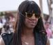 Kelly Rowland en mini-short au motif camouflage et bottes Valentino lors du Festival de Coachella. Le 13 avril 2013.