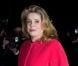 Catherine Deneuve lors du défilé Yves Saint Laurent prêt-à-porter Automne-Hiver 2013-2014 au Grand Palais à Paris, le 4 mars 2013.