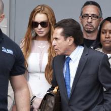 Lindsay Lohan à la sortie de son procès pour un accident de voiture survenu en juin 2012, au tribunal de Los Angeles, le 18 mars 2013.