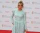Sienna Miller sur le tapis rouge des  Arqiva British Academy Television Awards  au Royal Festival Hall, à Londres, le 12 mai 2013.