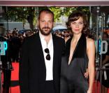 Maggie Gyllenhaal et son compagnon Peter Sarsgaard à la première de Batman, à Londres, le 21/07/08