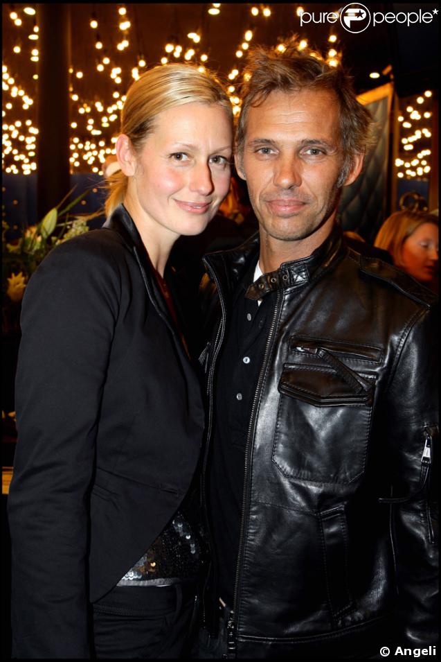 Le couple Belmondo junior toujours aussi glamour à l'ouverture de la boutique Christian Audigier à Paris