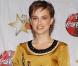 Natalie Portman, souvent récompensée, arborait à cette occasion une jolie robe moutarde et une coupe courte 