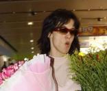 Sophie Marceau et Christophe Lambert à l'aéroport de Beijing, en Chine, le 12 février dernier