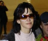 Sophie Marceau et Christophe Lambert à l'aéroport de Beijing, en Chine, le 12 février dernier