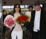 Sophie Marceau et Christophe Lambert à l'aéroport de Beijing, en Chine, le 12 février dernier