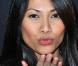 La charmante Anggun nous envoie des baisers, lors du quatrième anniversaire de la chaîne de la TNT NRJ 12, qui s'est tenue le 18 mars 2009 au VIP Room Theatre, à Paris.