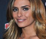 La très jolie Clara Morgane, lors du quatrième anniversaire de la chaîne de la TNT NRJ 12, qui s'est tenue le 18 mars 2009 au VIP Room Theatre, à Paris.