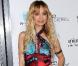 Radieuse et époustouflante de beauté, Nicole Richie porte comme à son habitude une longissime robe satinée aux couleurs enivrantes ! A L.A le 23 mars 2009