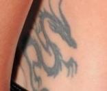 http://static1.purepeople.com/articles/2/27/86/2/@/190792-rihanna-et-son-tatouage-dragon-a-la-156x133-3.jpg