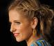 Sarah Michelle Gellar a opté pour une tresse sur le côté à effet ébouriffé  