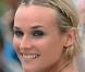 Diane Kruger et ses nattes enroulées, superbe sur un teint parfait comme cela  