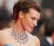 Milla Jovovich et sa natte de côté, un bel effet assuré sur tapis rouge
