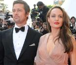 Brad Pitt et Angelina Jolie lors de la montée des marches avant la projection d'Inglourious Basterds, au Festival de Cannes, le 20 mai 2009