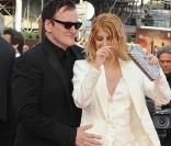 Quentin Tarantino danse avec Mélanie Laurent lors de la montée des marches avant la projection d'Inglourious Basterds, au Festival de Cannes, le 20 mai 2009