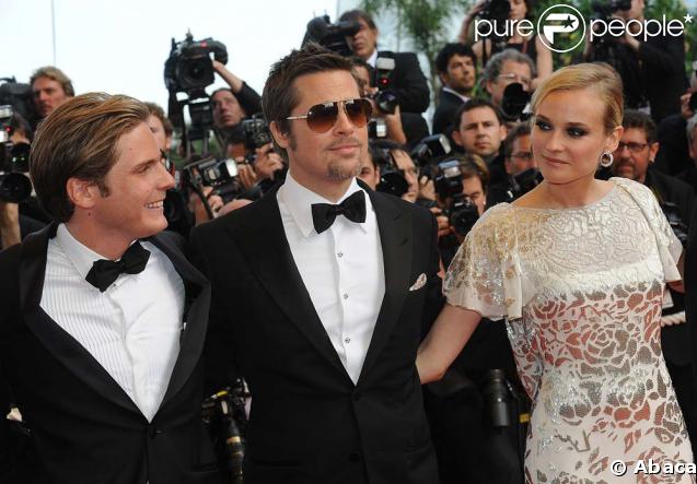 Brad Pitt et Diane Kruger lors de la montée des marches avant la projection d'Inglourious Basterds, au Festival de Cannes, le 20 mai 2009