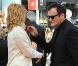 Mélanie Laurent et Quentin Tarantino dansent sur le tapis rouge, à Cannes, juste avant la projection du film Inglourious Basterds. 20/05/09