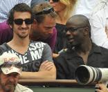 Roland-Garros 2009 : pour les huitièmes de finale disputés le lundi de Pentecôte, les célébrités sont venues en nombre. En couple et en famille ! Yohan Micoud et Lilian Thuram. 