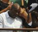 Roland-Garros 2009 : pour les huitièmes de finale disputés le lundi de Pentecôte, les célébrités sont venues en nombre. En couple et en famille ! Jean-Marc Mormeck et sa compagne. 